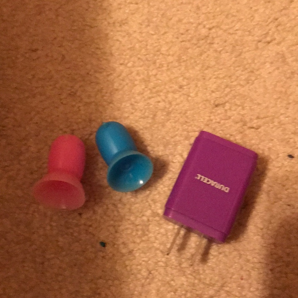 2 dog pop sockets and a portable box